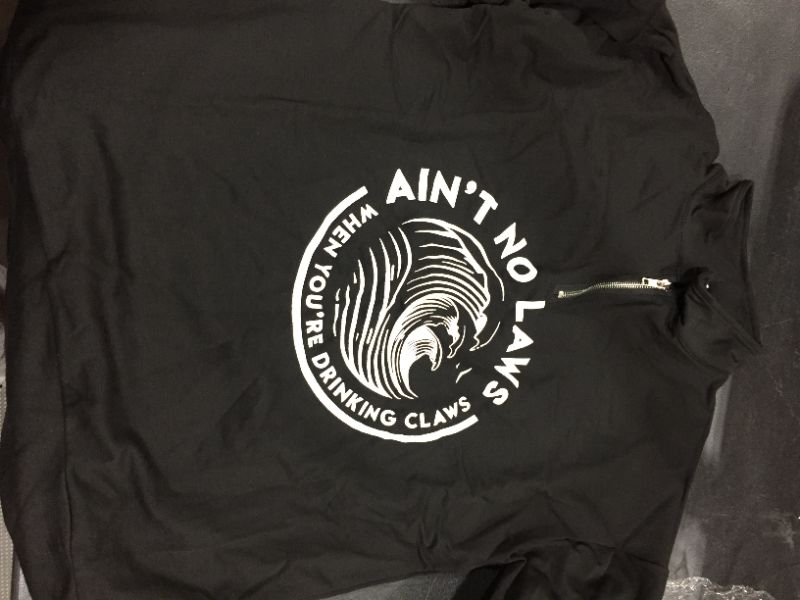 Photo 1 of "AINT NO LAWS WHEN DRINKING WHITE CLAWS" Black Zip-up hoodie (size S)