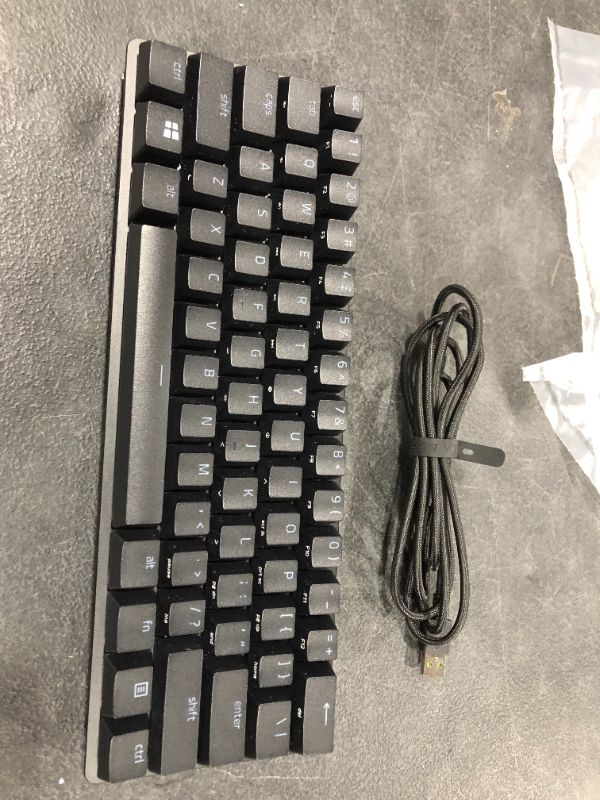 Photo 3 of Razer Huntsman Mini 60% Gaming Keyboard: Fastest Keyboard Switches Ever - Clicky Optical Switches - Chroma RGB Lighting - PBT Keycaps - Onboard Memory - Classic Black
