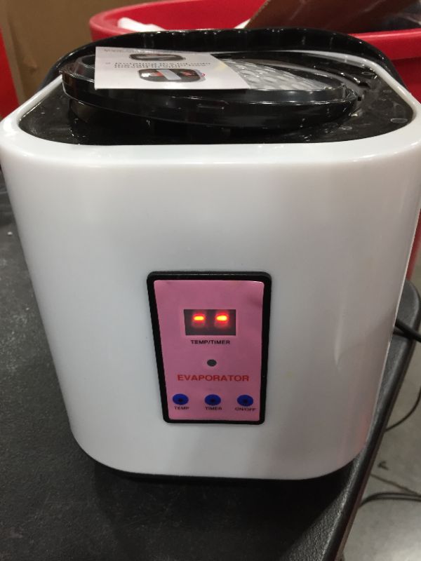 Photo 1 of 2 L evaporator