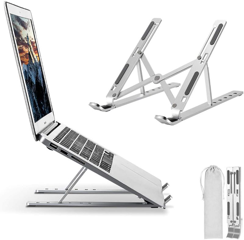 Photo 1 of Laptop Stand Adjustable Aluminum Laptop Computer Stand Laptop Riser Holder Compatible with MacBook Air Pro, HP, Lenovo, Dell, More 10-15.6” Laptops Collapsible and Non-Slip Aluminum Metal Holder