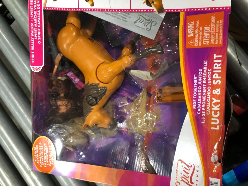 Photo 2 of Spirit Untamed Ride Together Lucky Doll (7-in) & Spirit Horse (8-in), Button Feature Lets Doll Ride Horse with Realistic Walking & Moving Joints, Great Gift for Ages 3 Years Old & Up