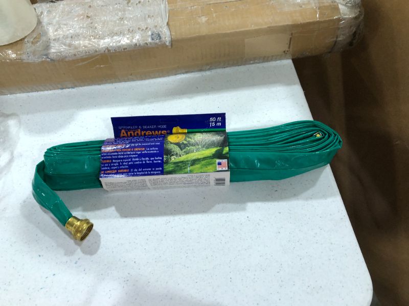 Photo 2 of Andrews 50-Foot 2 Tube Sprinkler Hose 10-12348
