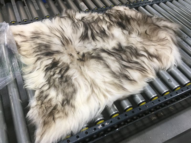 Photo 1 of ABOUT 42 X 24 INCH FAUX FUR PELT RUG