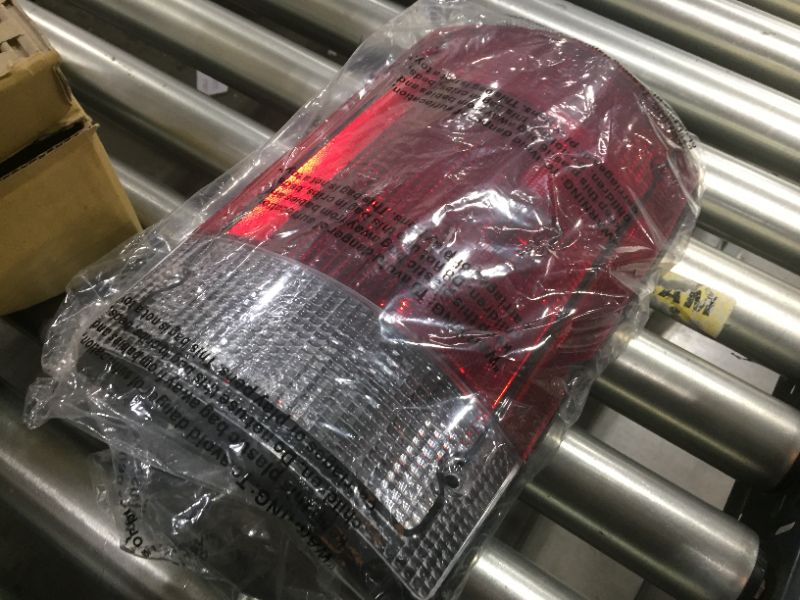 Photo 2 of TYC 11-5007-80-9 Tail Light Assembly for your 2009 Ford E-150