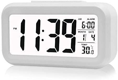 Photo 1 of MOYO Optically Controlled Liquid Crystal Device Alarm Clock,Night in The Bedroom Soft Light Does not Affect Sleep,in The Morning Progressively Louder Wakey Alarm Wake You Up –White
