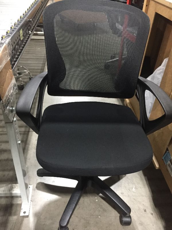 Photo 1 of BLACK MESH OFFICE CHAIR, MISSING ONE WHEEL