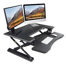 Photo 1 of Taotronics Standing Desk, TaoTronics 36" Stand Up Desk Adjustable Desk Standing Desk Converter Sit Stand Desk Riser, Desktop Standup Desk