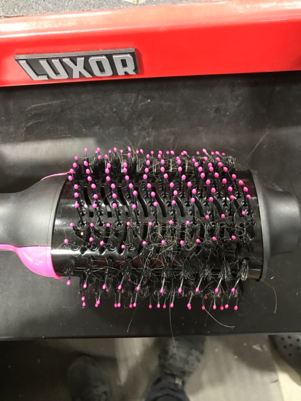 Photo 1 of Pink and Black Blow Dryer Brush