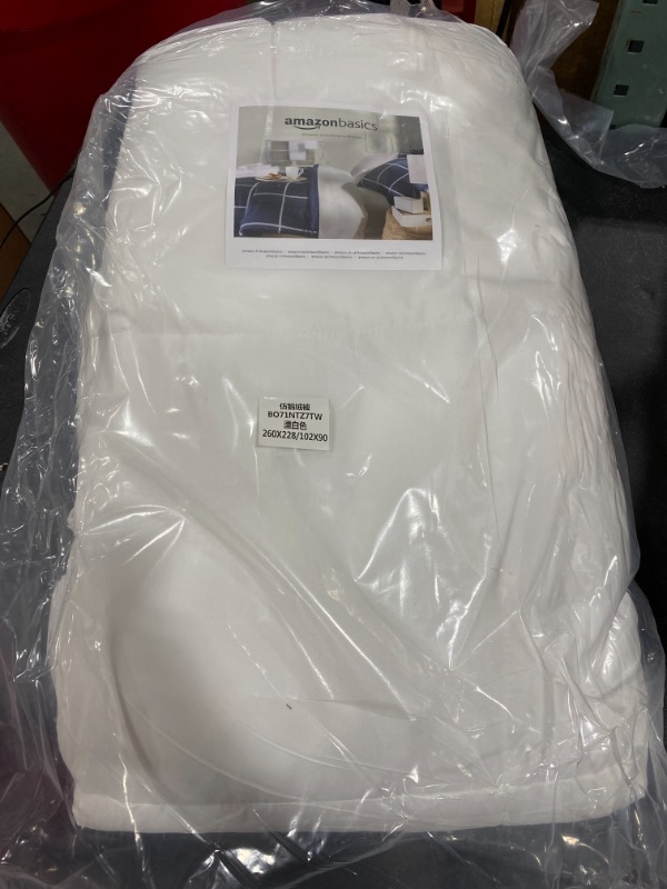 Photo 1 of Amazon basics 102x90 white comforter 