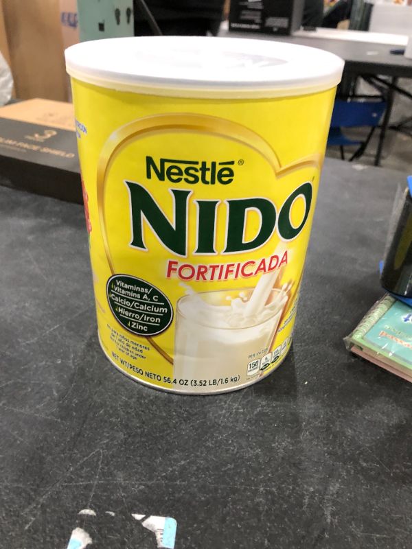 Photo 2 of NESTLE NIDO Fortificada Dry Milk 56.4 Ounce Canister EXP. AUG 31 2021