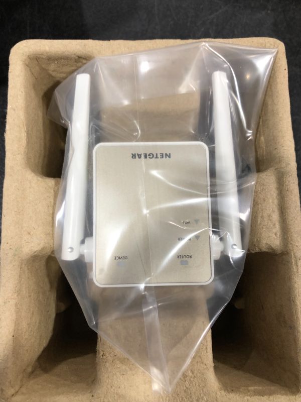 Photo 2 of NETGEAR Wi-Fi Range Extender EX6120 - Coverage Up to 1500 Sq Ft and 25 Devices with AC1200 Dual Band Wireless Signal Booster & Repeater (Up to 1200Mbps Speed), and Compact Wall Plug Design
