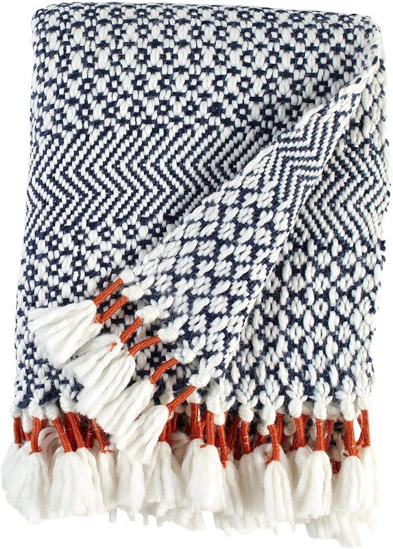 Photo 1 of Amazon Brand – Rivet Modern Hand-Woven Stripe Fringe Throw Blanket, 50" x 60", Navy Blue and White with Sienna Orange
