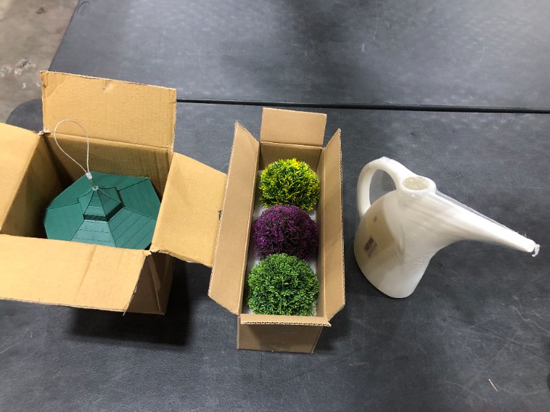 Photo 1 of BOX LOT OF ASSORTED HOUSEHOLD ACCESSORIES, ARTIFICIAL PLANTS, WATERING CAN, BIRD FEEDER, 3 PIECES COUNT