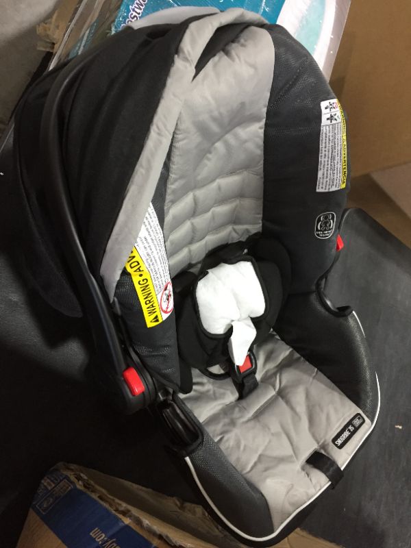 Photo 2 of Graco FastAction Fold Jogger Travel System | Includes the FastAction Fold Jogging Stroller and SnugRide 35 Infant Car Seat, Gotham