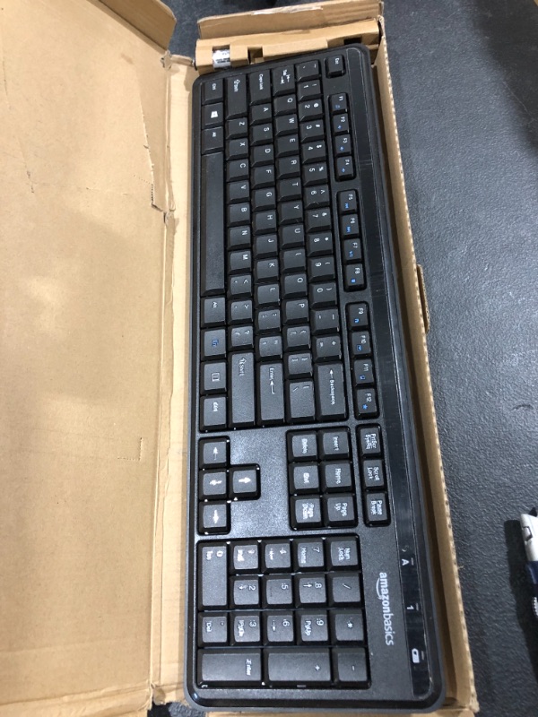 Photo 1 of Amazon Basics Wireless Computer Keyboard - Quiet and Compact - US Layout (QWERTY)
