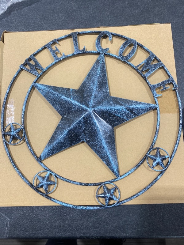 Photo 1 of Blue metal "welcome" star decoration