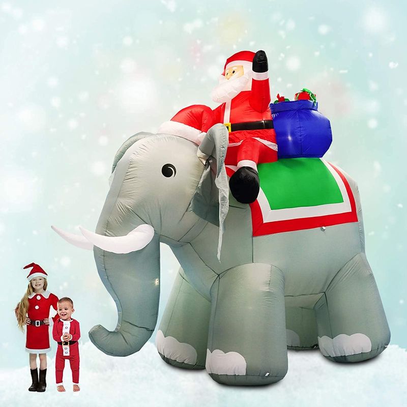 Photo 1 of 10.5 Ft Inflatable Christmas Elephant with Santa Decoration Xmas Decorations for Home Yard Lawn Garden Party Outdoor Indoor Night
