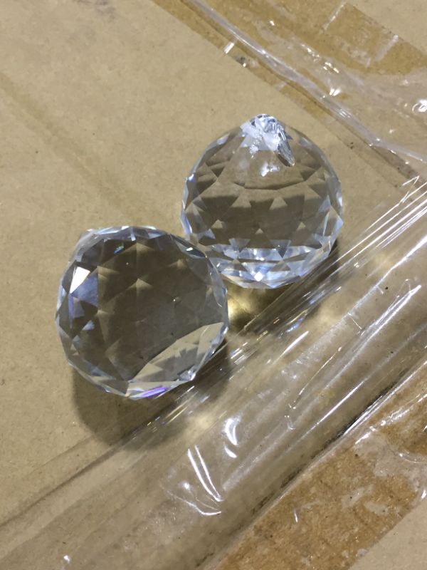 Photo 1 of Suncatcher Crystals Ball Prism Window Rainbow Maker with Chain for Easy Hanging, PACK OF 70
Some of the crystal balls have scratches 
