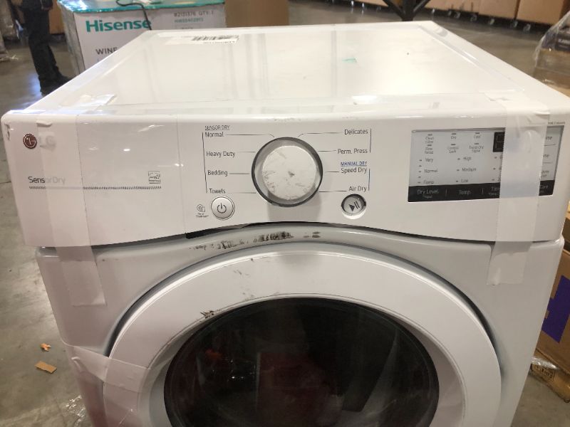 Photo 3 of LG - 7.4 Cu. Ft. Stackable Electric Dryer with FlowSense™ - White, HEAVY DAMAGE, NON FUNCTIONAL AND SOLD FOR PARTS