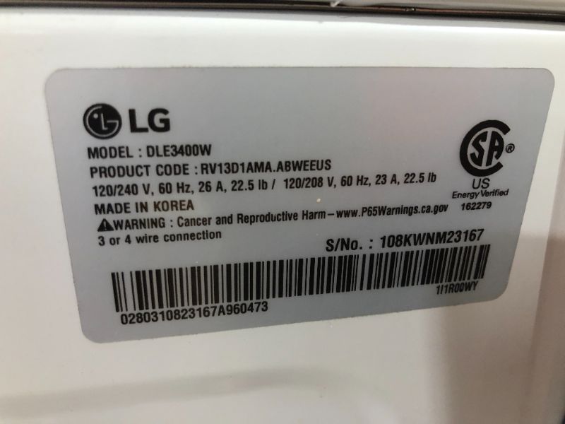 Photo 6 of LG - 7.4 Cu. Ft. Stackable Electric Dryer with FlowSense™ - White, HEAVY DAMAGE, NON FUNCTIONAL AND SOLD FOR PARTS