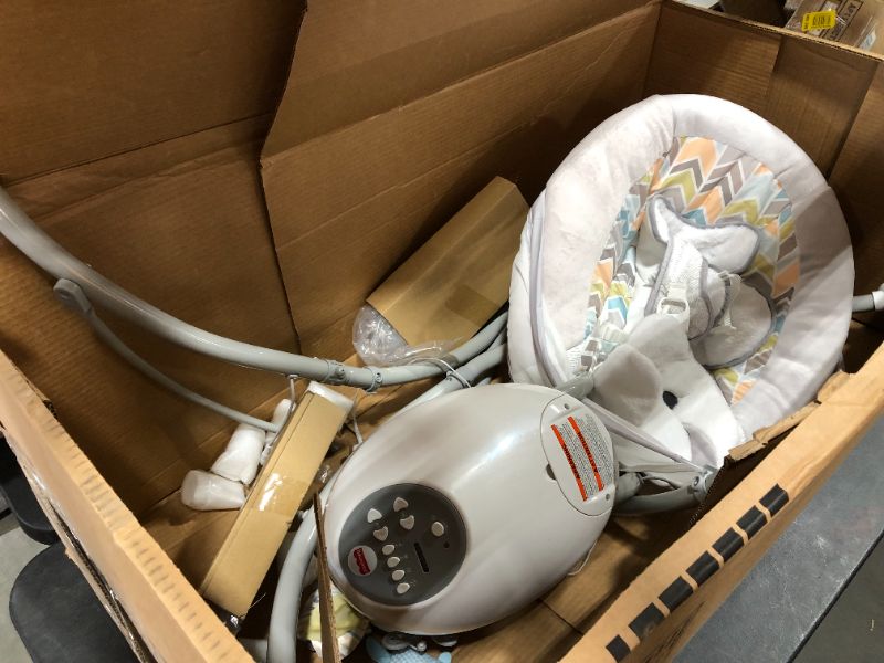 Photo 1 of Fisher-Price Sweet Snugapuppy Deluxe Bouncer, Portable Bouncing Baby Seat with Overhead Mobile, Music, and Calming Vibrations
