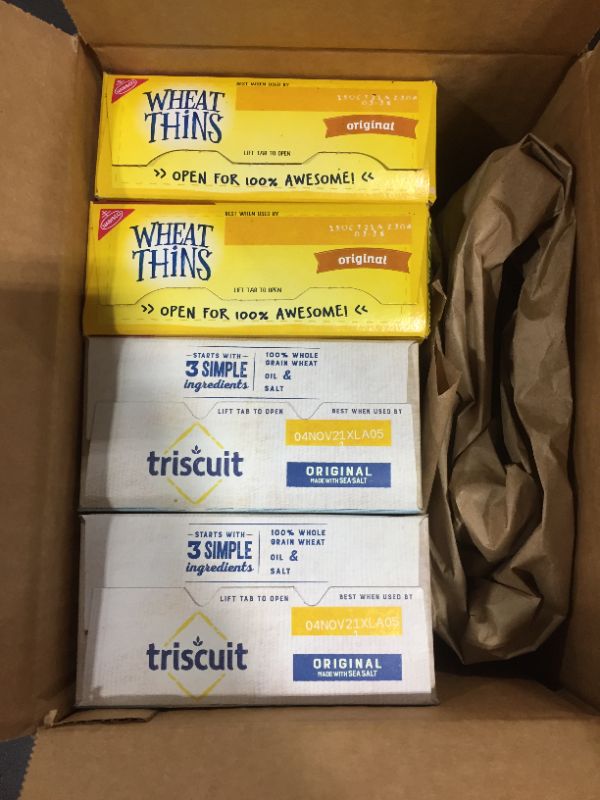 Photo 1 of 2 wheat thins boxes and 2 triscuilt boxes