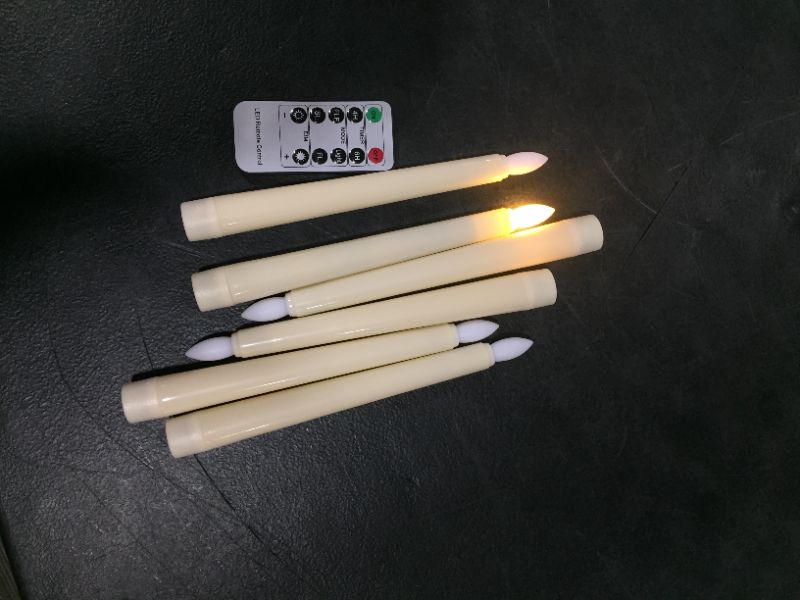 Photo 2 of 7.9 Inch Flameless Christmas Taper Window Candles with Remote Timers, 6 Packs Battery Operated Led Flickering Electric Candles with Realistic Flame Warm Lights for Home Party Holiday Decorations