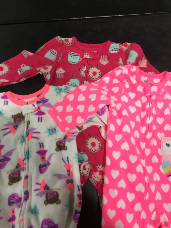 Photo 3 of Simple Joys by Carter's Baby and Toddler Girls' 3-Pack Loose Fit Fleece Footed Pajamas
SIzE 12MOS