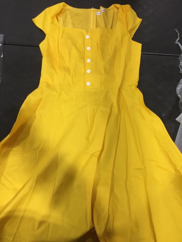 Photo 1 of WOMENS YELLOW MUADRESS
SIZE 2XL