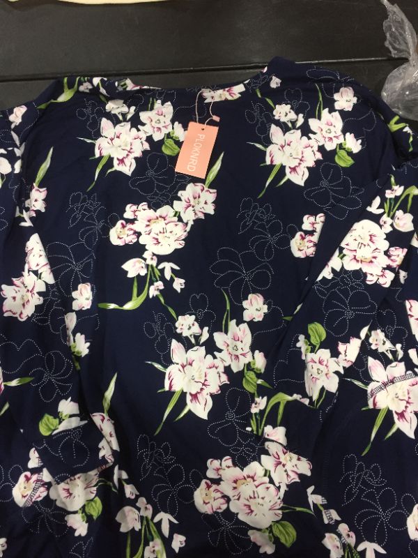 Photo 1 of WOMENS FLORAL SHIRT
SIZE 20W