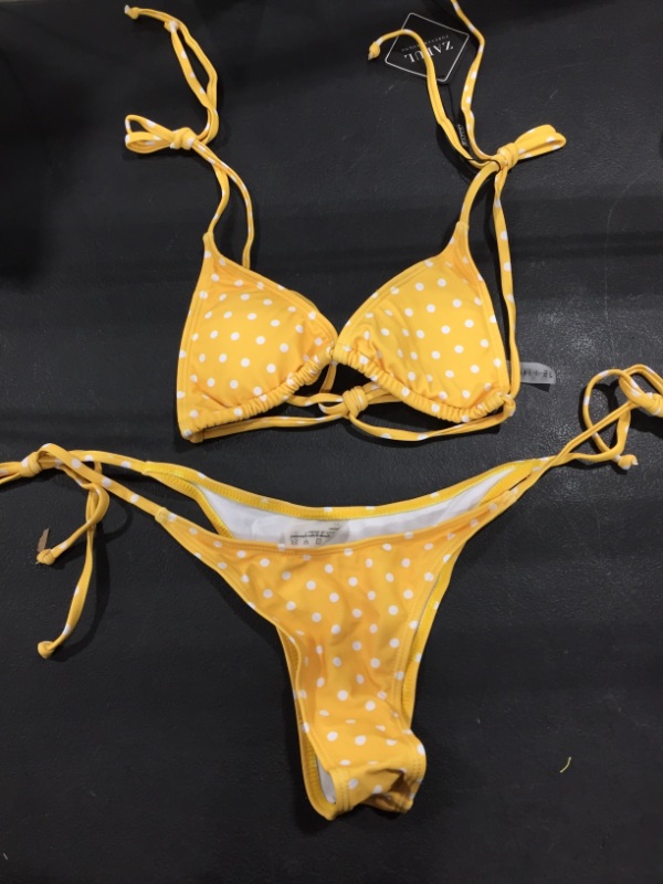 Photo 1 of Size S, yellow and white polka dotted bathing suit