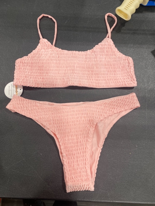 Photo 1 of Medium sized, Pink ruffled swimsuit 