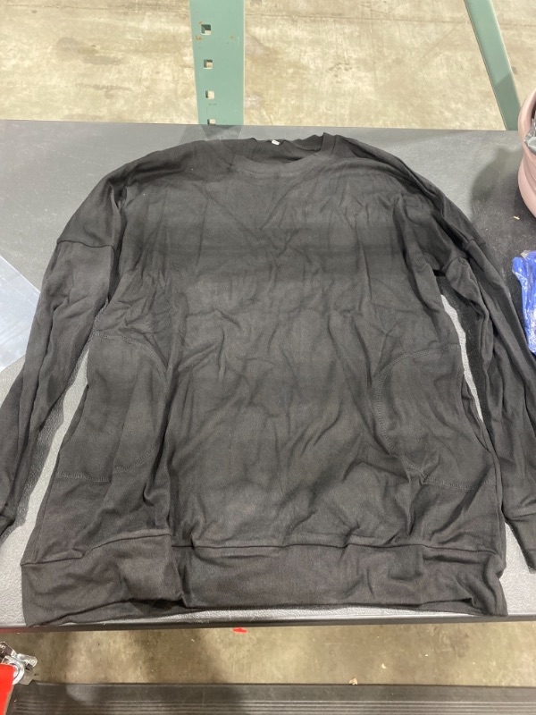 Photo 1 of Black long sleeve shirt with pockets, size L