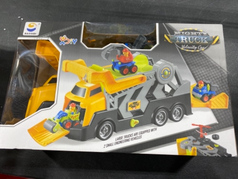 Photo 2 of Mighty Truck Velocity Car have sound effects this product included large trucks are equipped with 2 small engineering ve
