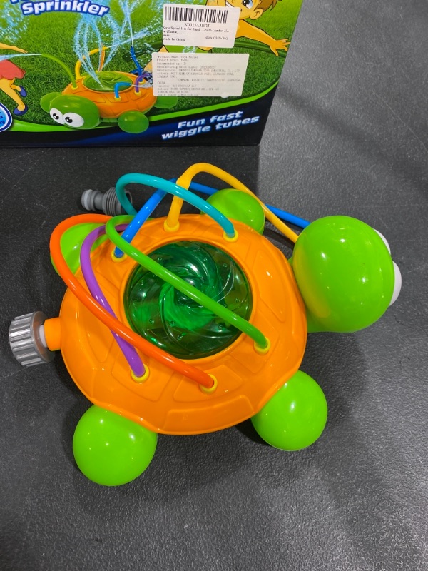 Photo 2 of Chuchik Outdoor Water Spray Sprinkler for Kids and Toddlers - Backyard Spinning Turtle Sprinkler Toy w/ Wiggle Tubes - Splashing Fun for Summer Days - Sprays Up to 8ft High - Attaches to Garden Hose
