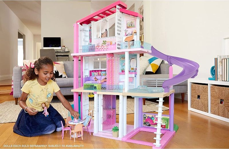 Photo 3 of Barbie Dreamhouse Dollhouse with Wheelchair Accessible Elevator, Pool, Slide and 70 Accessories Including Furniture and Household Items
