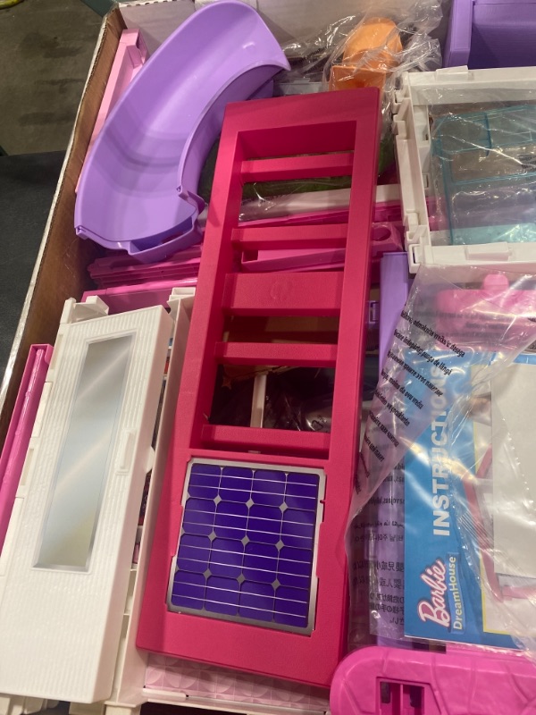 Photo 6 of Barbie Dreamhouse Dollhouse with Wheelchair Accessible Elevator, Pool, Slide and 70 Accessories Including Furniture and Household Items
