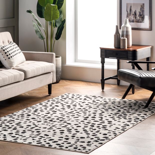 Photo 1 of Beige Cheetah Print 9' x 12' Area Rug
