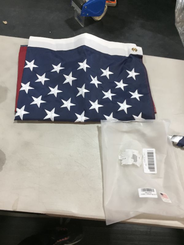 Photo 2 of American Flag 3x5 - 100% Made In USA using Tough, Long Lasting Nylon Built for Outdoor Use, Featuring Embroidered Stars and Sewn Stripes plus Superior Quadruple Stitching on Fly End