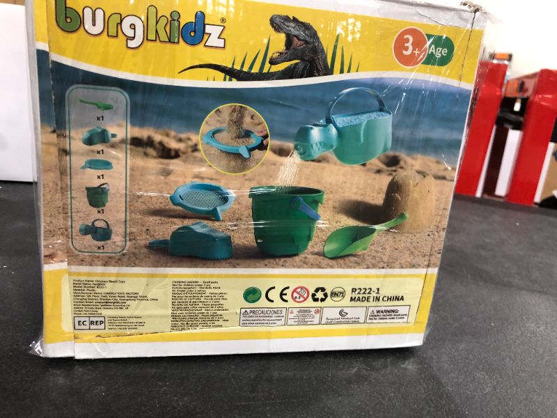 Photo 1 of burgkidz Beach Sand Toys Set for Kids, Toddlers Beach Toys Dinosaur Theme, Includes Mesh Beach Bag, Bucket, Shovels, Sifter, Rake, Dinosaurs Molds, Watering Can, Outdoor Toys for Beach
