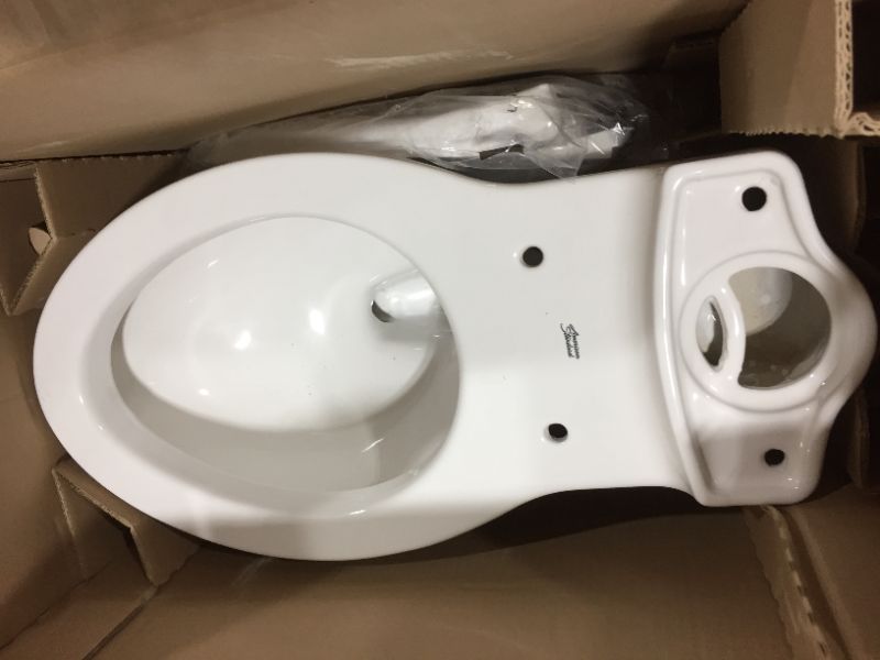 Photo 1 of Champion Tall Height 2-Piece High-Efficiency 1.28 GPF Single Flush Elongated Toilet in White Seat Included