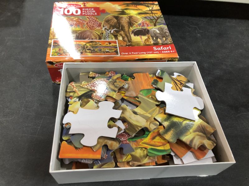 Photo 2 of Melissa & Doug African Plains Safari Jumbo Jigsaw Floor Puzzle (100 pcs, over 4 feet long)
