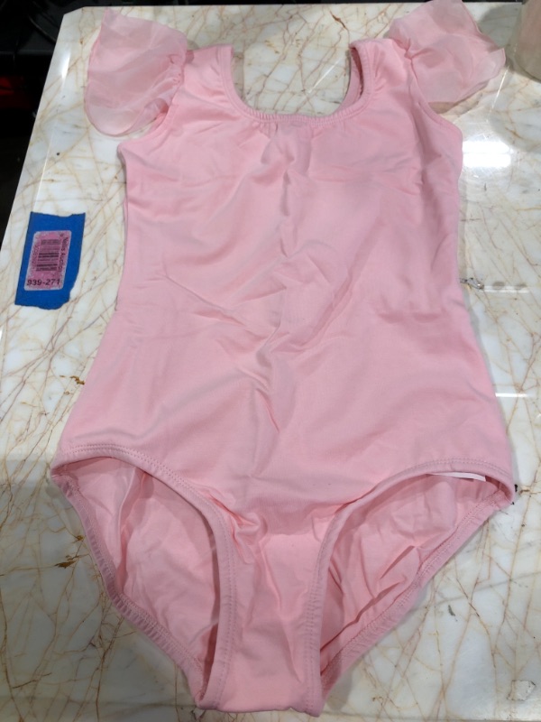 Photo 1 of childrens pink onesie with flaired off shoulder cuffs