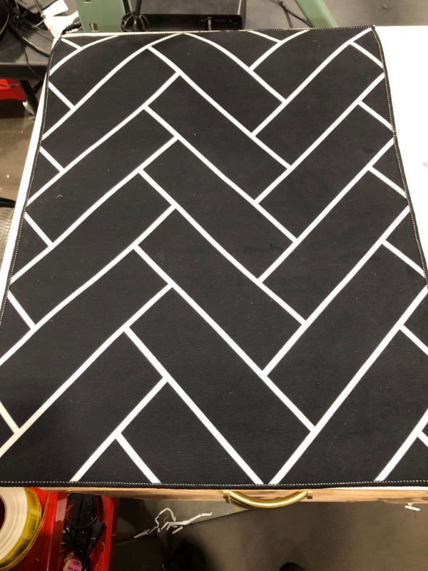 Photo 1 of 18.5 x 25 and 48 x 18.5 black and white rugs