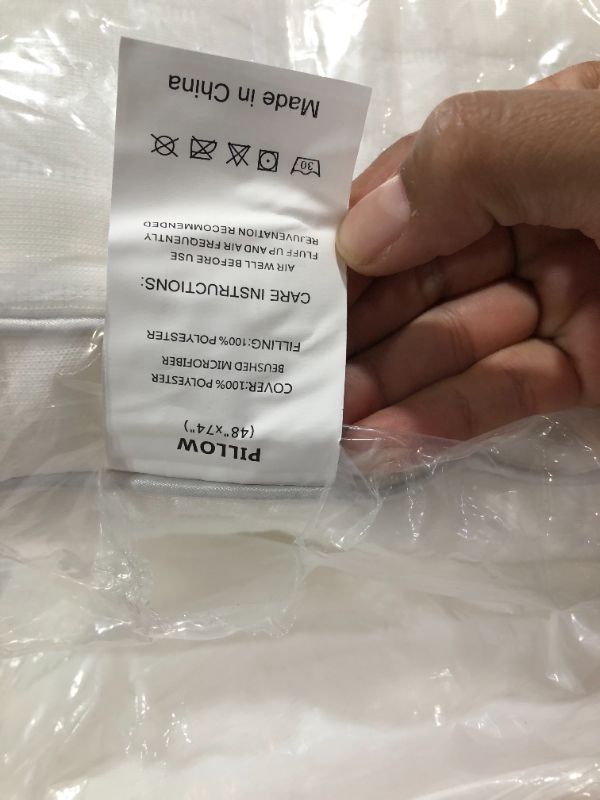 Photo 1 of 2 pillows 