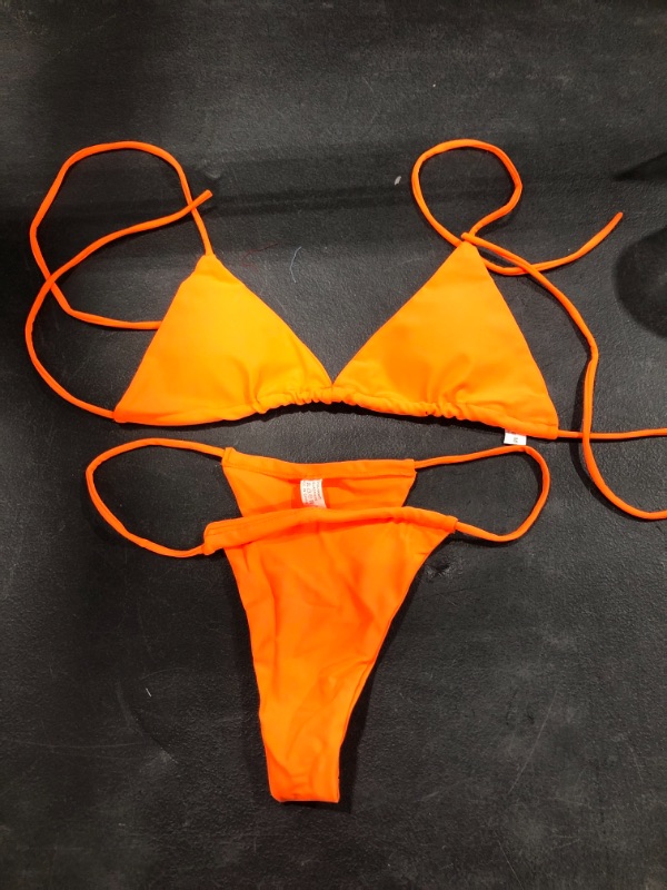 Photo 1 of Neon orange two piece bathing suit, Size medium, Sizing runs small (Chinese sizing)