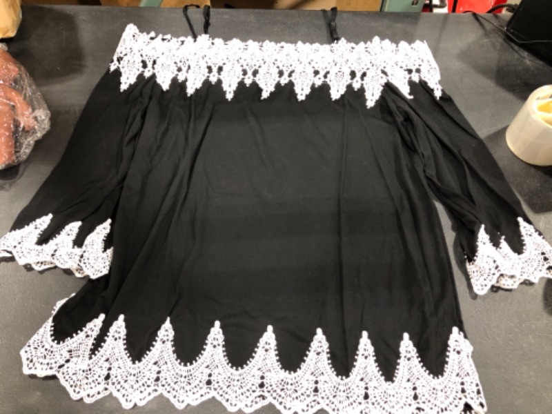 Photo 1 of Off shoulder white and black womens shirt 