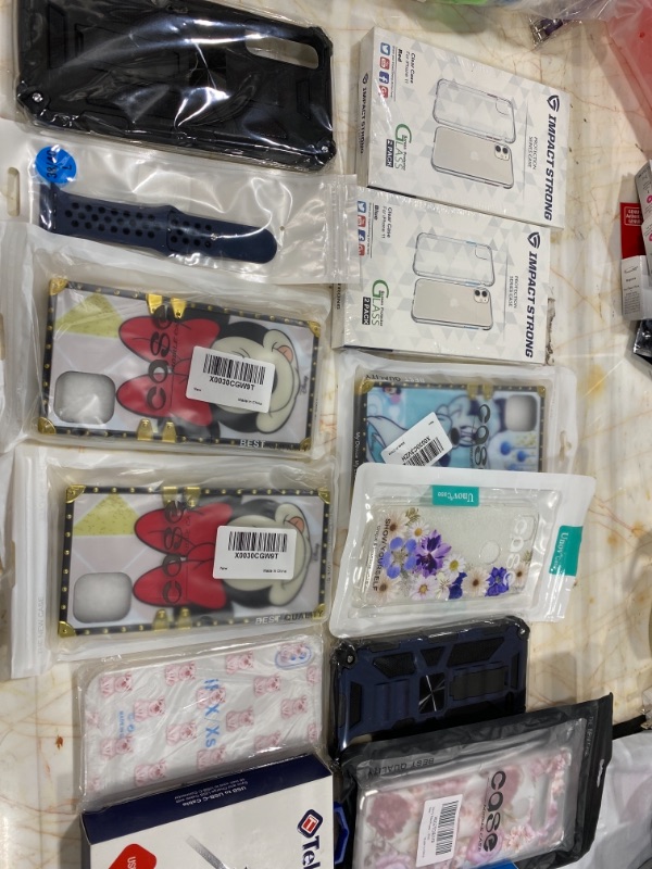 Photo 2 of Box lot - phone cases, accessories, and cables 