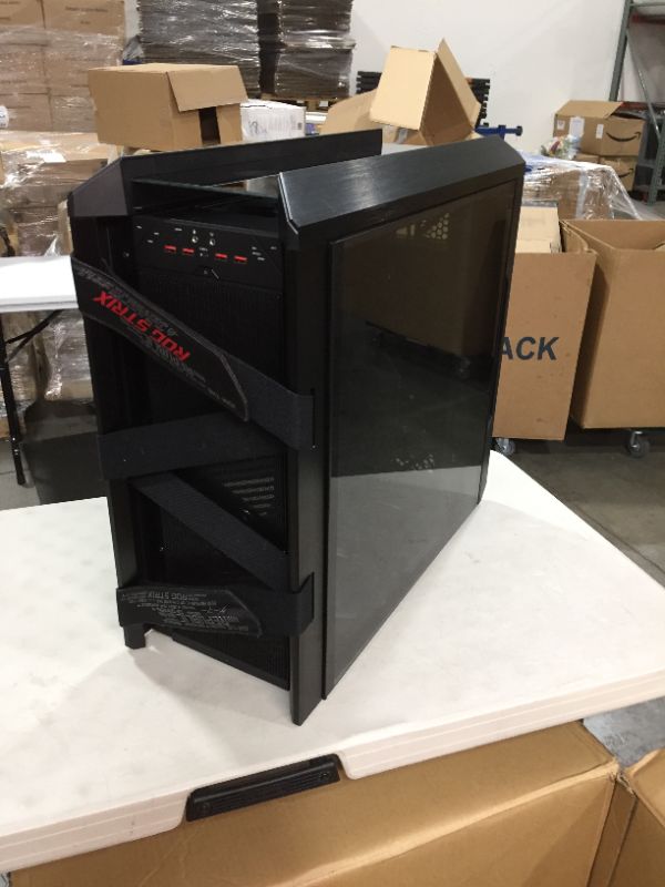 Photo 6 of Asus ROG Strix Helios GX601 RGB Mid-Tower Computer Case for up to EATX Motherboards with USB 3.1 Front Panel, Smoked Tempered Glass, Brushed Aluminum and Steel Construction, and Four Case Fans, Black