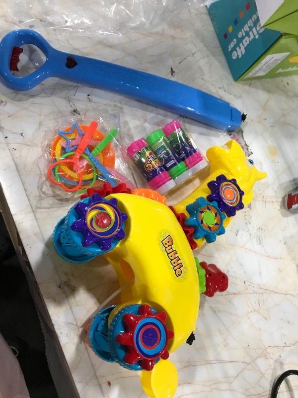 Photo 1 of Icnice Bubble Mower, Bubble Machine for Kids Toddlers Automatic Bubble Blower Anti-Leak Bubble Maker Lawn Game Include Bubble Wand Outdoor Push Toy Music Light Projector Baby Walker-5 Bubble Solution
